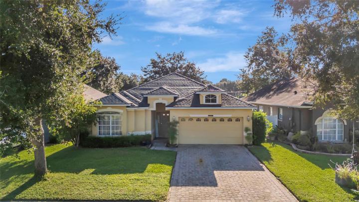 4877 GRASSY KNOLL DRIVE, TAVARES, FL